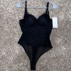 black, lacey body suit